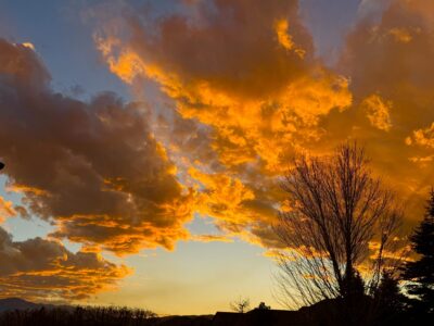 Vibrant sunset clouds illuminating in the evening sky.